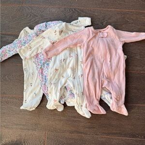 Carters Girls long sleeve footies. Size NB EUC.